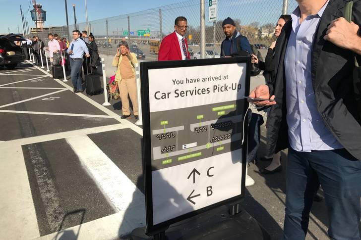 In the "for hire" car service pick-up lot at LaGuardia Airport on April 4, 2017<br>